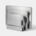 Pure Titanium Cutting Board Set - three titanium cutting boards in OMEGA board holder