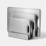 Pure Titanium Cutting Board Set - three titanium cutting boards in OMEGA board holder