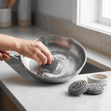 Cleaning a titanium pan with the steel pan scrubber