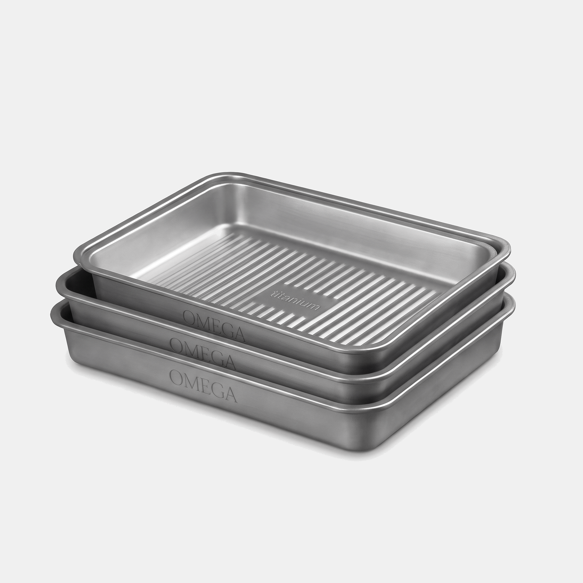 Three stacked Titanium Baking Trays - Buy 2 Get 1 Free